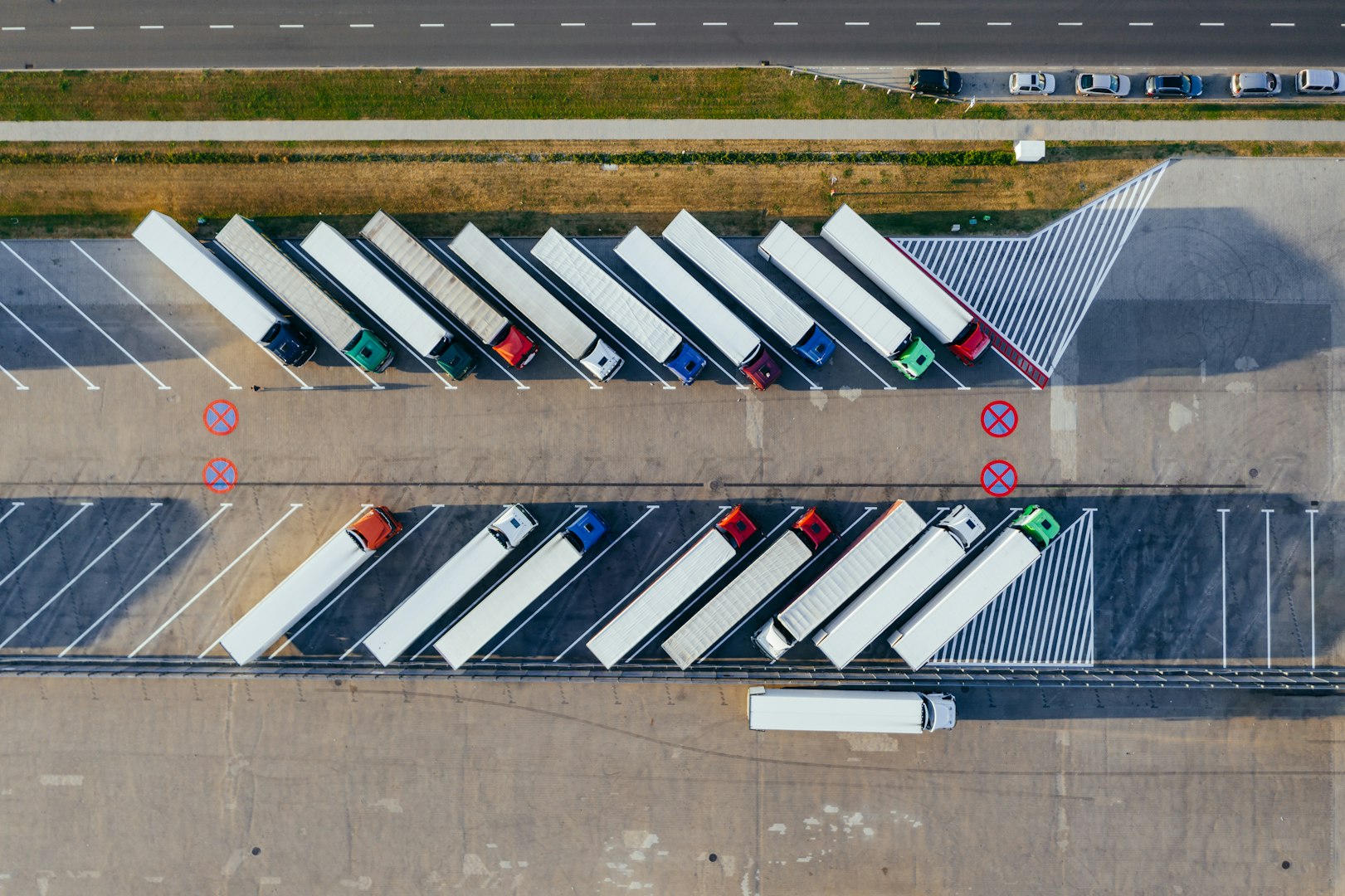 A red truck moving down the motorway